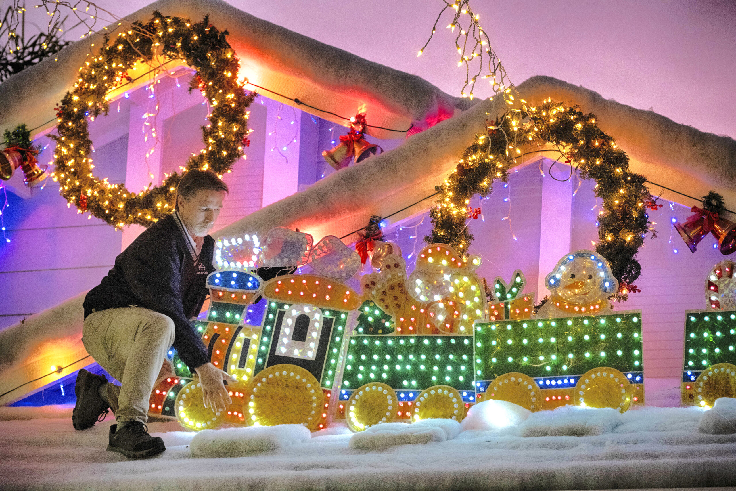 Elaborate holiday light displays are making spirits bright in a